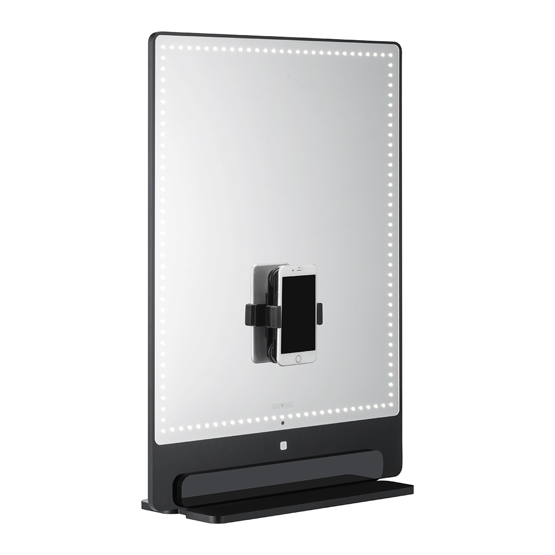 Riki Tall Vanity Mirror - Phone clip and magnifying mirror to improve your beauty routine.
