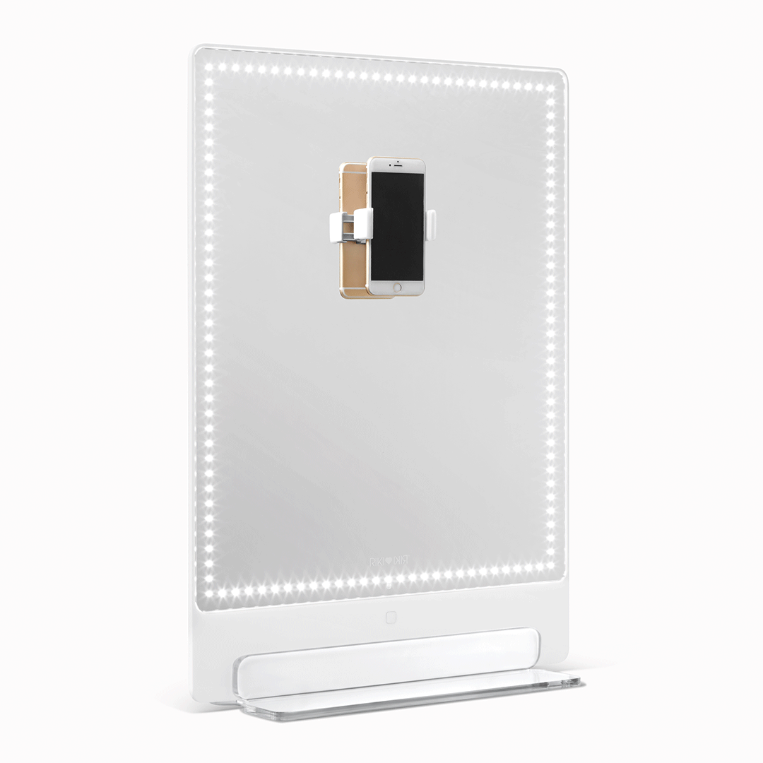 Riki Tall Vanity Mirror - Phone clip and magnifying mirror to improve your beauty routine.