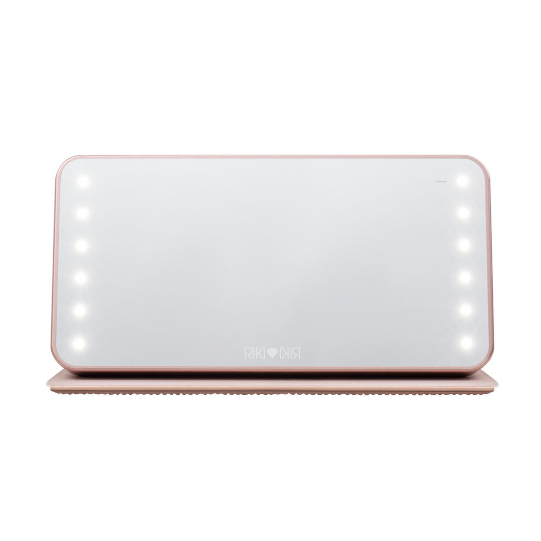 Front view of the Sparkle RIKI Powerful LED-lighted mirror and power bank in rose gold by RIKI LOVES RIKI, perfect for flawless makeup application with a light up travel mirror.