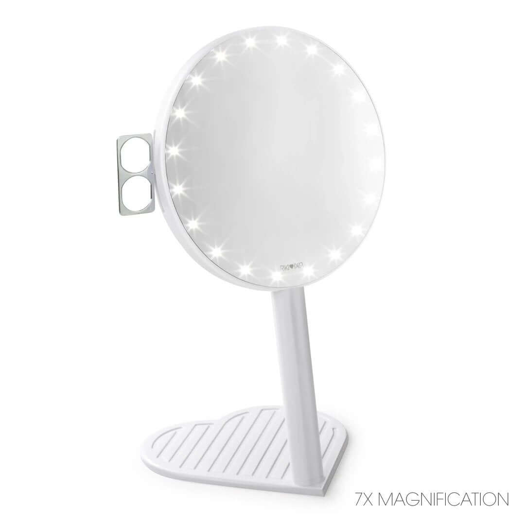 The RIKI GRACEFUL compact vanity mirror in white, featuring a 7X magnifying handheld mirror with LED lights and a heart-shaped base.