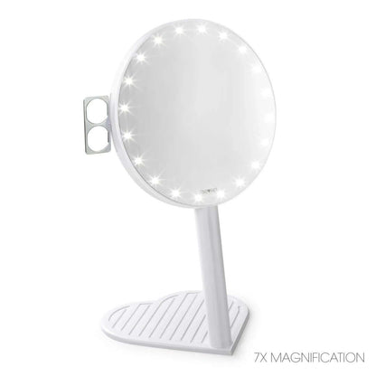 The RIKI GRACEFUL compact vanity mirror in white, featuring a 7X magnifying handheld mirror with LED lights and a heart-shaped base.