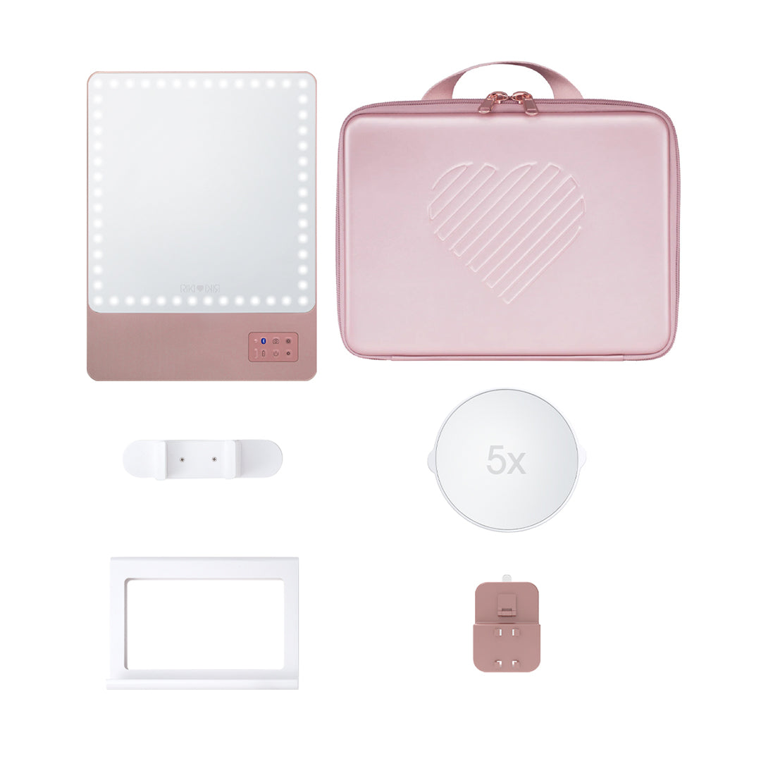 Travel beautifully with the RIKI Babe Travel Set in Rose Gold. Includes the RIKI SKINNY mirror with 5x magnifying attachment and a carry bag, making it easy to achieve perfect makeup anywhere!