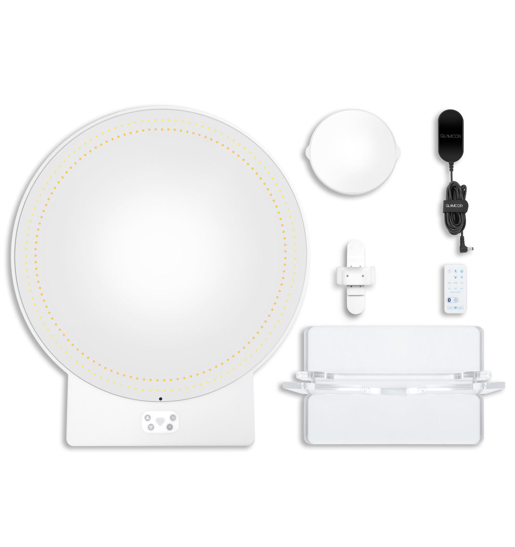 RIKI SASSY round mirror with remote control for selfies and lighting adjustments.