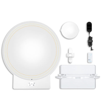 RIKI SASSY round mirror with remote control for selfies and lighting adjustments.