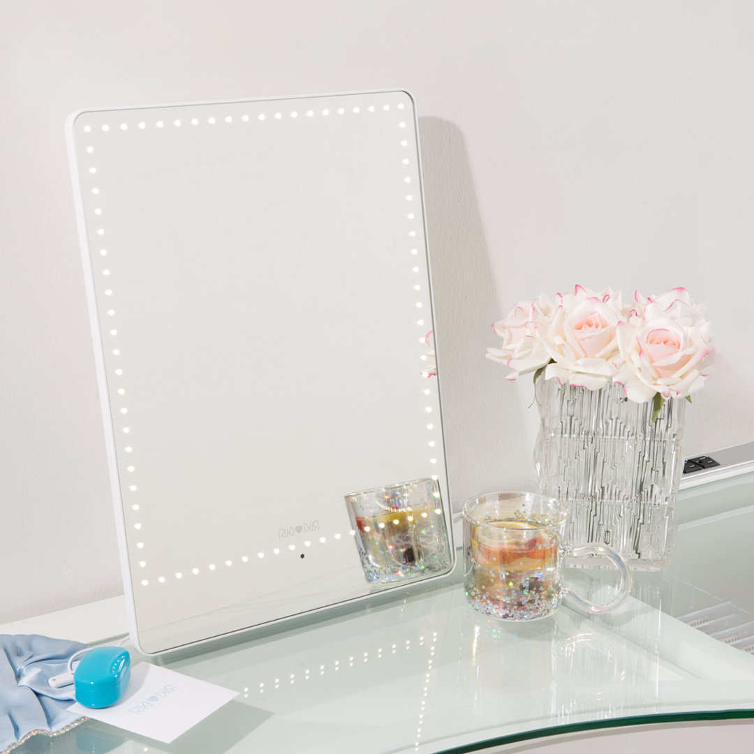 Elevate your content creation space with RIKI Pretty - the ultimate vanity mirror and phone holder by RIKI LOVES RIKI, setting a new standard for beauty and content creation.